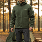 The army green fleece jacket worn on a woodland path, full length