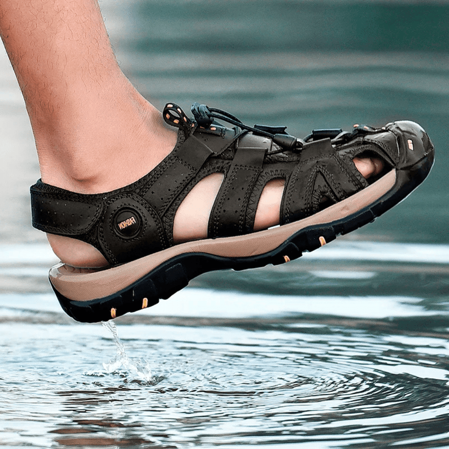 Terrabound Hiking Sandal lifted out of the water, dripping