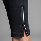 Zipped ankle cuff with reflective strip alongside