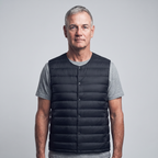 Men's Terrabound down gilet in Black, front view worn over a t-shirt