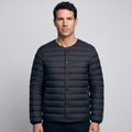 Terrabound Men's Down Jacket in Black, convertible collar closed, worn front view