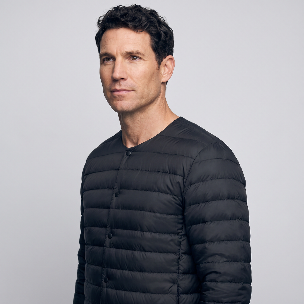 Terrabound Men's Down Jacket in Black, three-quarter side view