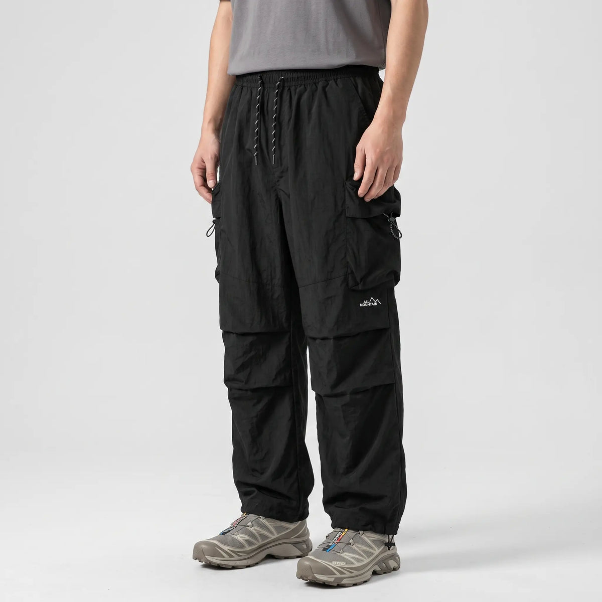 Terrabound baggy cargo trousers in Black, side view