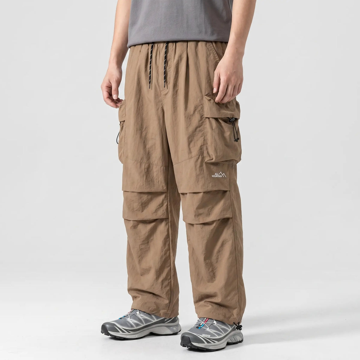 Terrabound baggy cargo trousers in Dark Khaki, side view
