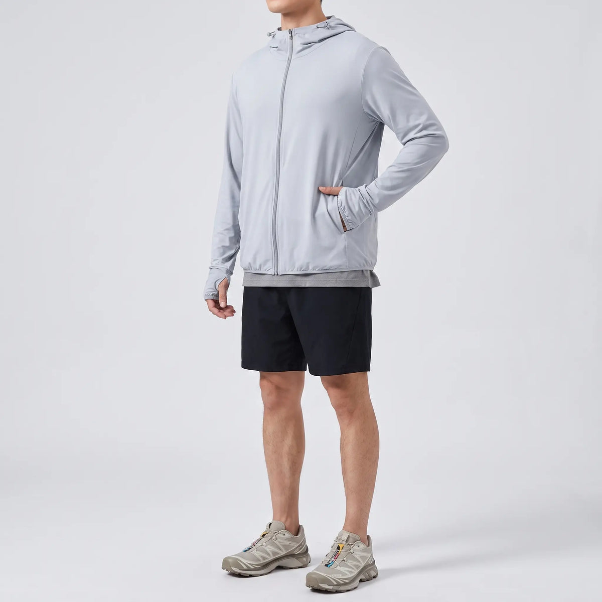 Men's full-zip sun hoodie in light grey, three-quarter side view