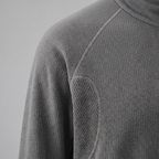 Close-up of the textured knit fabric and ribbed panel on the Terrabound half-zip fleece