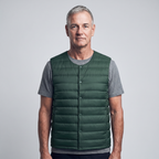 Men's Terrabound down gilet in Dark Green, front view worn over a t-shirt