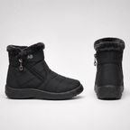 Black winter boot from the outer side with the zip and badge, and from behind