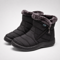 Women's faux fur lined winter boots in black, a pair with the side zip and fur collar