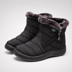 Women's faux fur lined winter boots in black, a pair with the side zip and fur collar