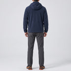 Men's navy blue windproof fleece jacket worn, back view