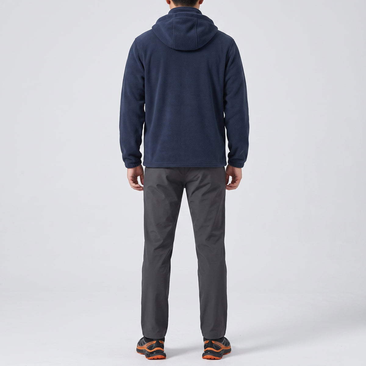 Men's navy blue windproof fleece jacket worn, back view
