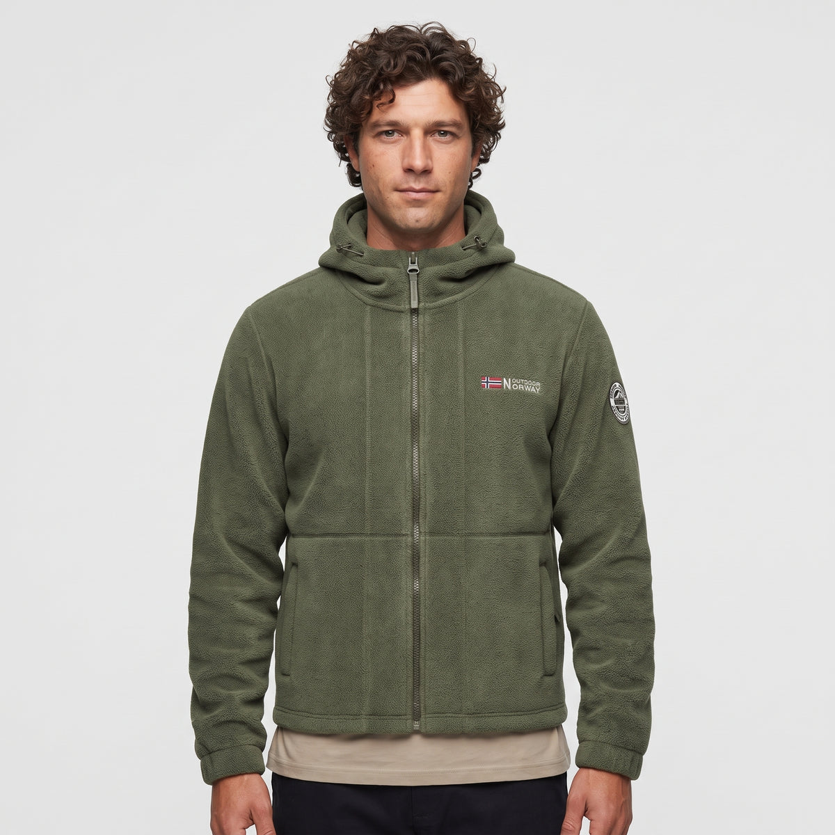 Men's army green windproof fleece jacket worn zipped up, front view