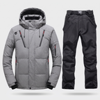 Men's Ski Suit in Grey: hooded ski jacket and black ski trousers with braces