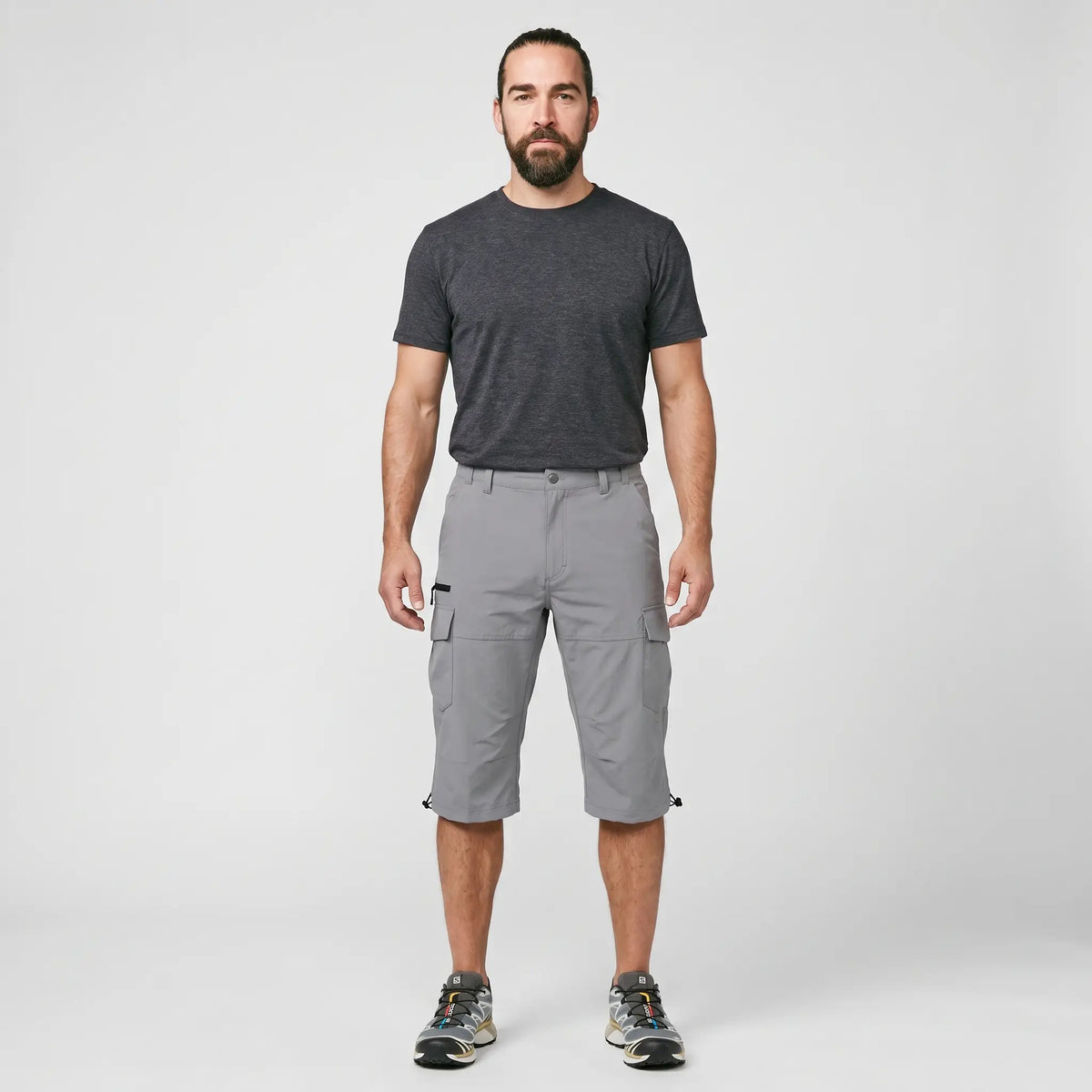 Man wearing grey 3/4 cargo shorts, full length