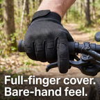 Gloved hand on a mountain bike grip and brake lever
