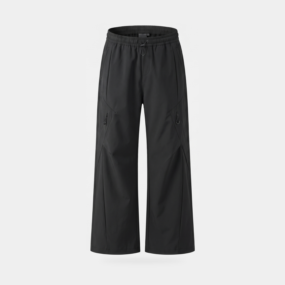 Women's wide leg walking trousers in black, front view, showing the elasticated drawcord waist and two diagonal zip thigh pockets