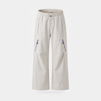 Women's wide leg walking trousers in light grey, front view, showing the open hand pockets at the side seam