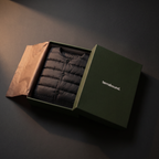Terrabound Men's Down Jacket in Black folded in minimal packaging