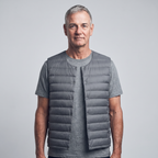 Men's Terrabound down gilet in Grey, front view worn over a t-shirt