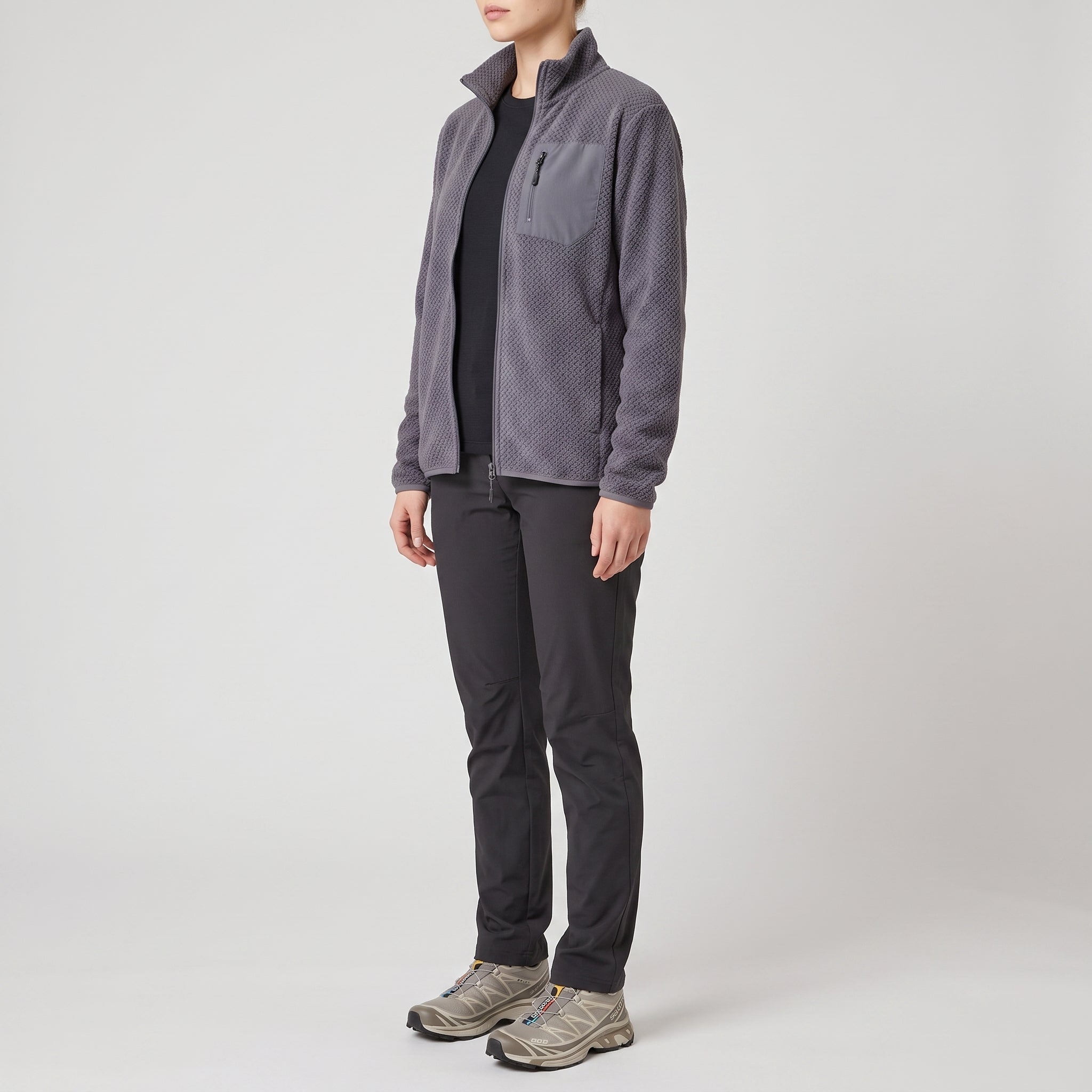 The grey fleece jacket worn, three-quarter side view