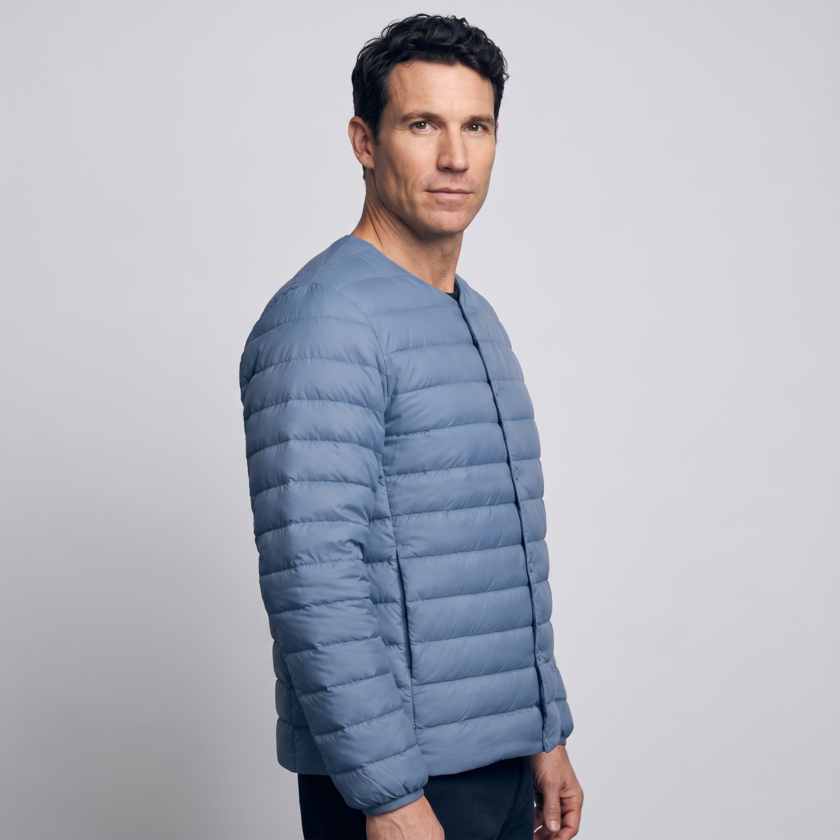 Terrabound Men's Down Jacket in Haze Blue, three-quarter side view