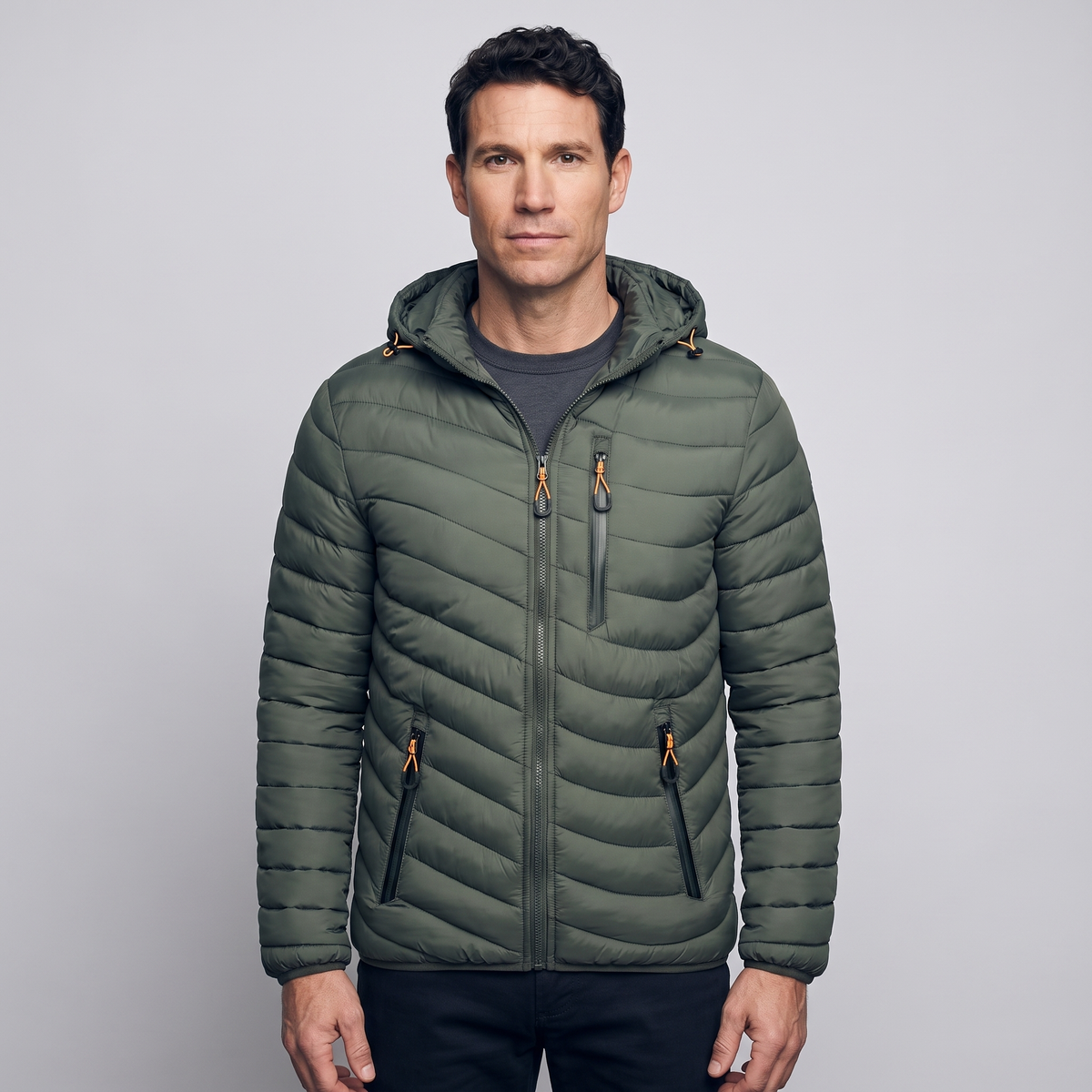 Men's puffer coat in Army Green worn by a model