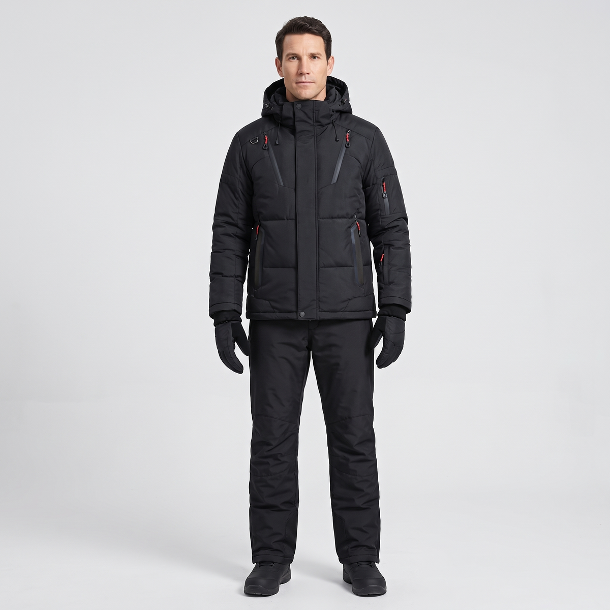 Men's Ski Suit with Black jacket and black ski trousers, worn full length