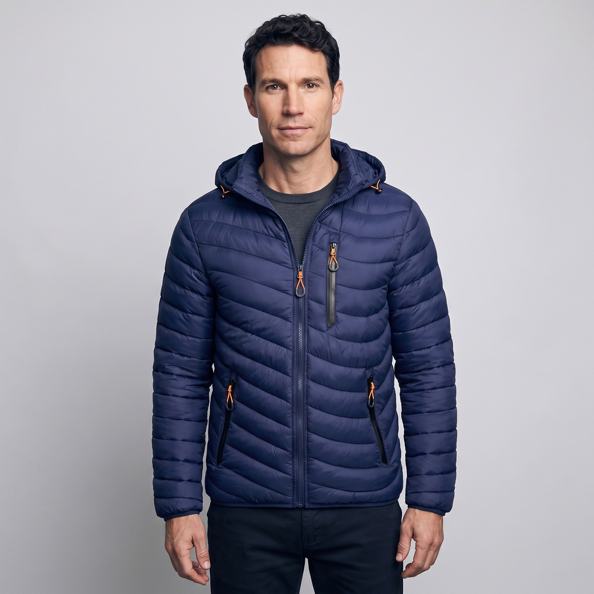 Men's puffer coat in Navy Blue worn by a model