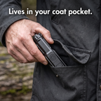 Pocket torch sliding into a coat pocket