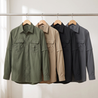 Men's hiking shirt in green, khaki, black and grey on a clothes rail