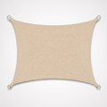 Terrabound shade sail in beige, a rectangle with curved edges and a steel D-ring at each corner