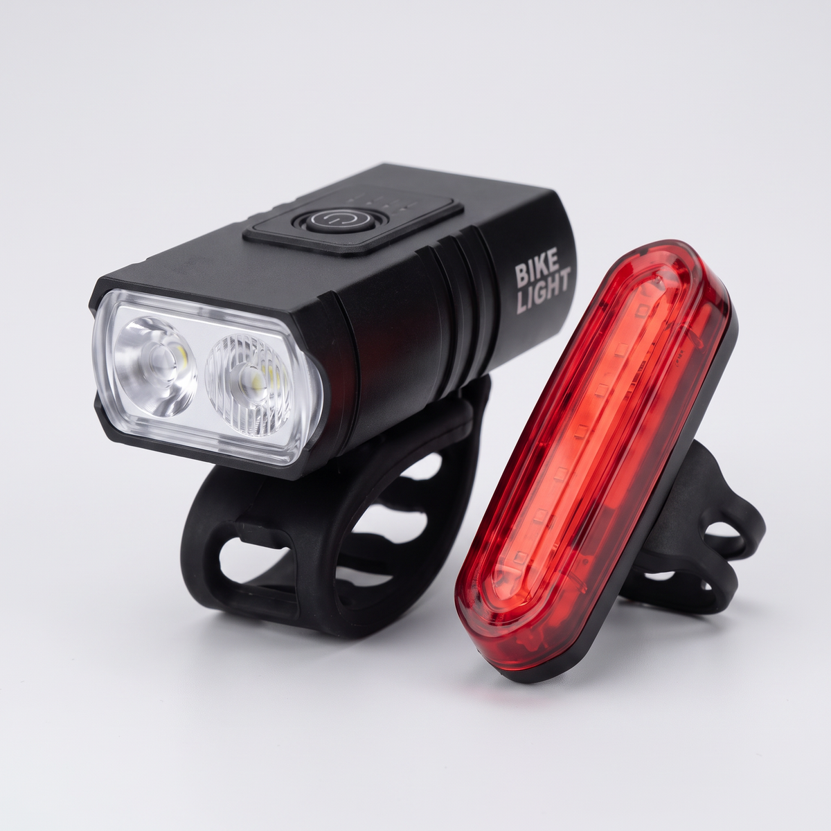 Terrabound rechargeable front and rear bike light set on a light grey background