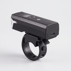 Back of the front bike light showing the USB-C charging port and the strap fastening