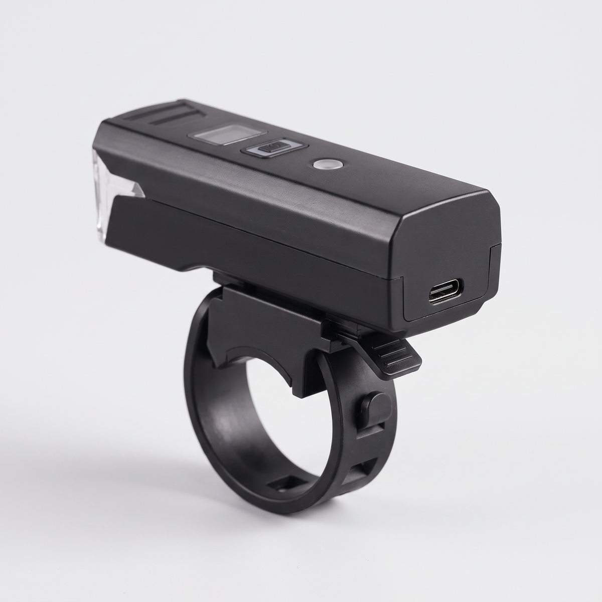 Back of the front bike light showing the USB-C charging port and the strap fastening