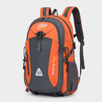 Terrabound 40L hiking rucksack in Orange, front three-quarter view on grey