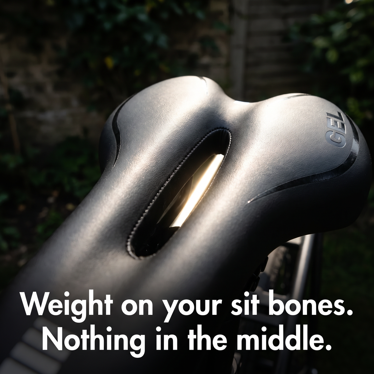 Close-up of light shining through the open cut-out of the gel bike seat