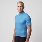 Man wearing the Sky Blue cycling jersey, three-quarter side view