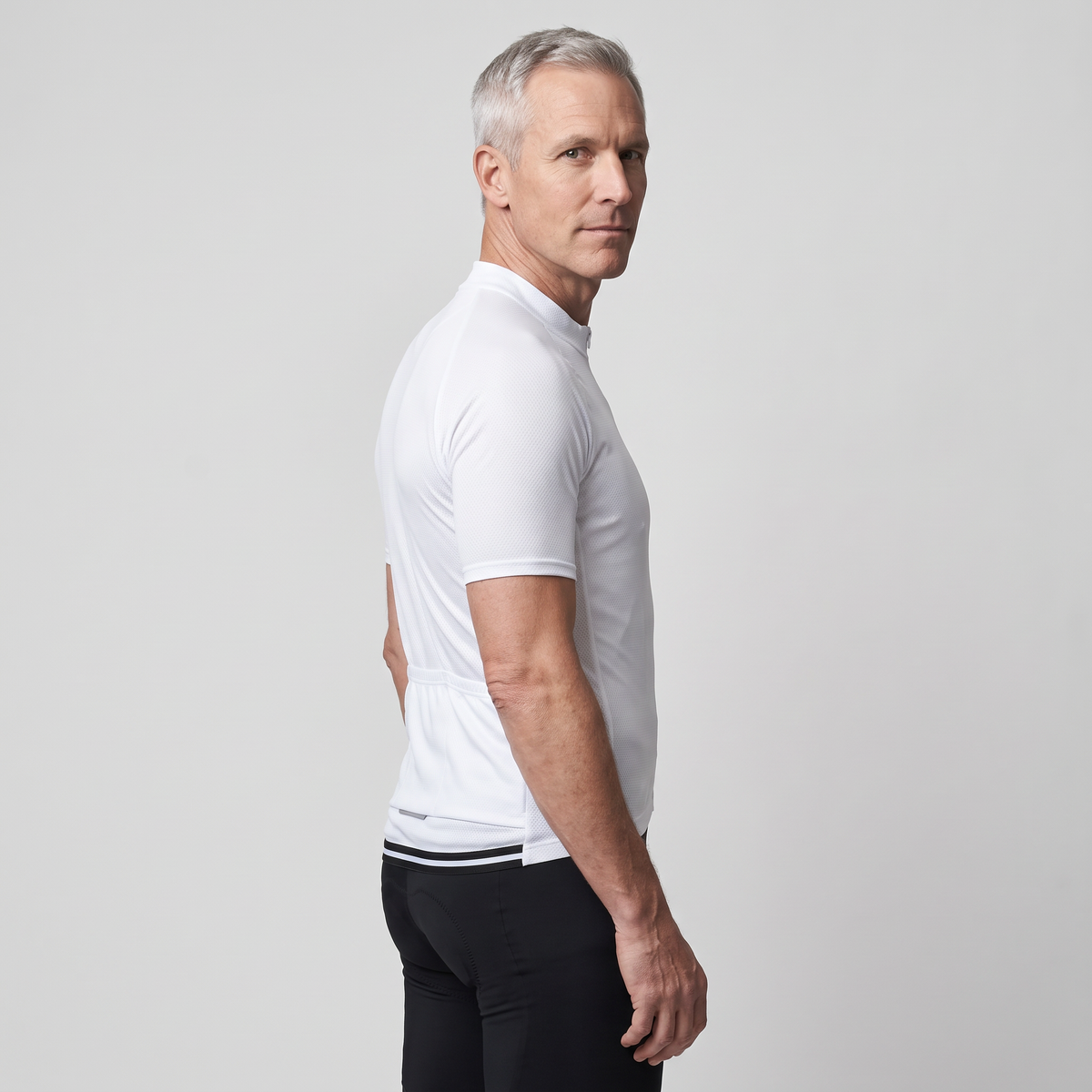 Man wearing the White cycling jersey, three-quarter side view