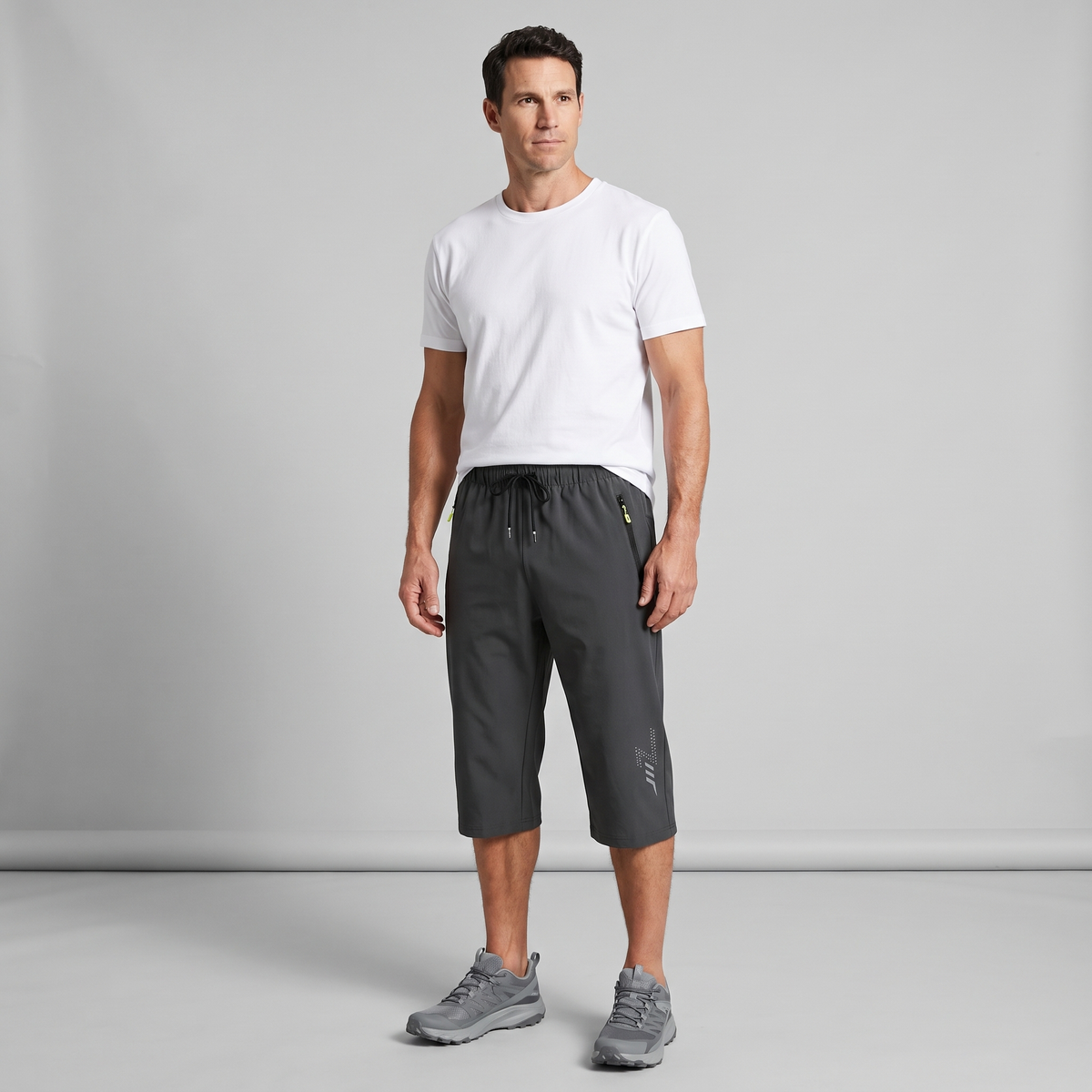 Men's 3/4 shorts in grey - full length on model
