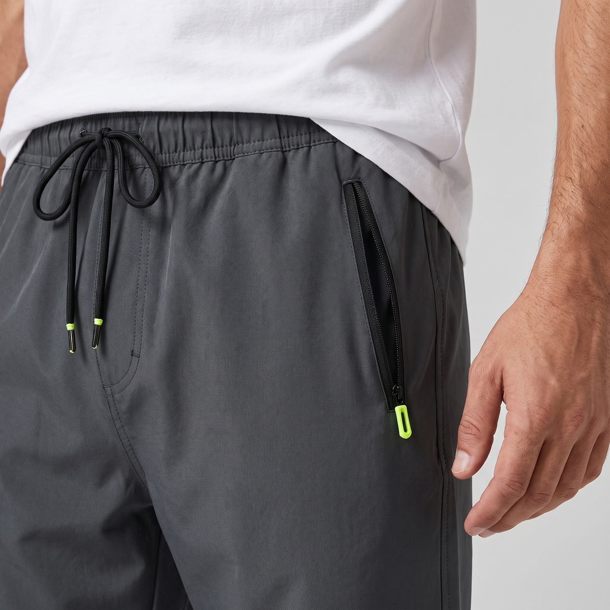 Men's 3/4 shorts - zip pocket and drawcord close-up
