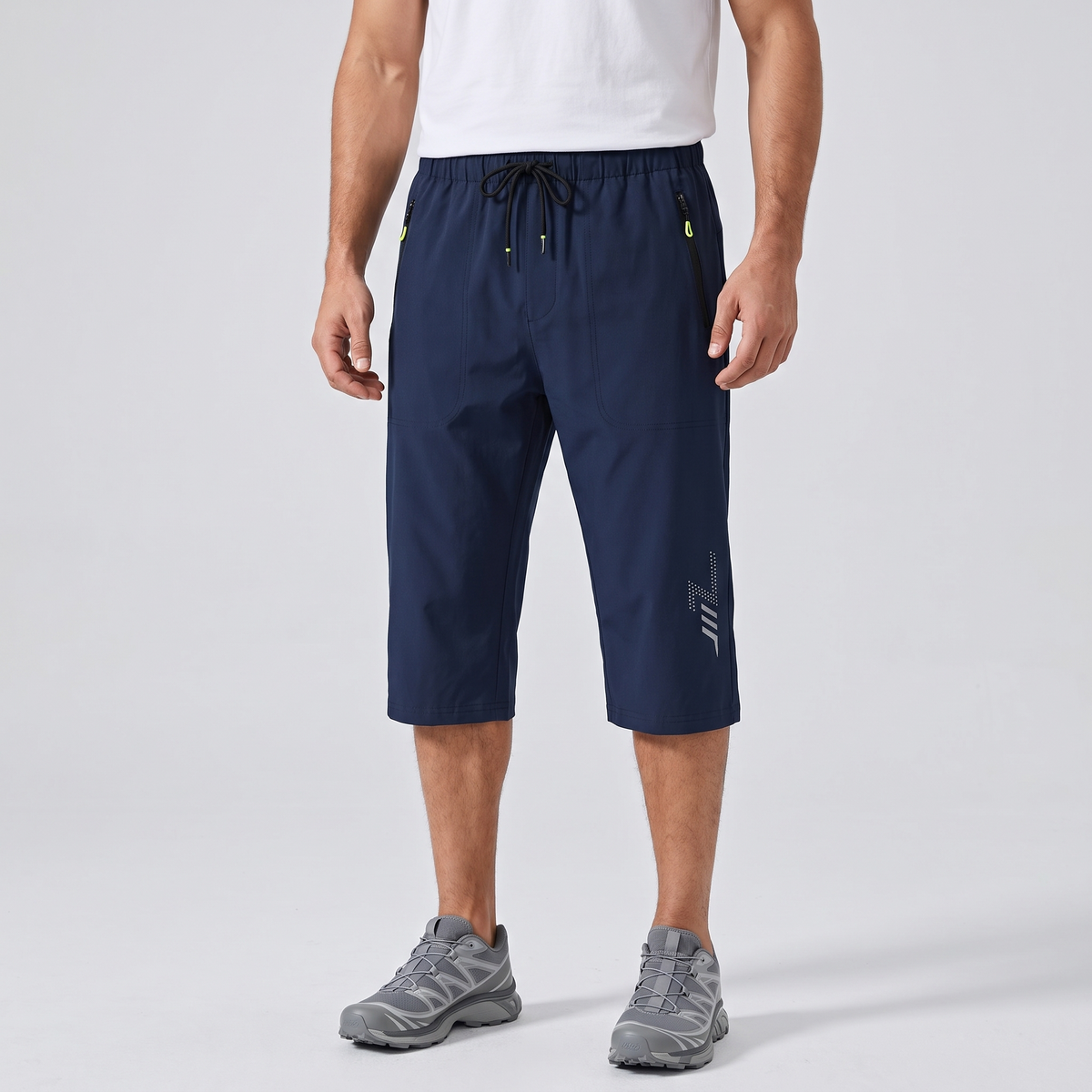 Men's 3/4 shorts in navy - worn front view