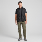 Man wearing the Terrabound men's padded gilet with olive chinos, full length