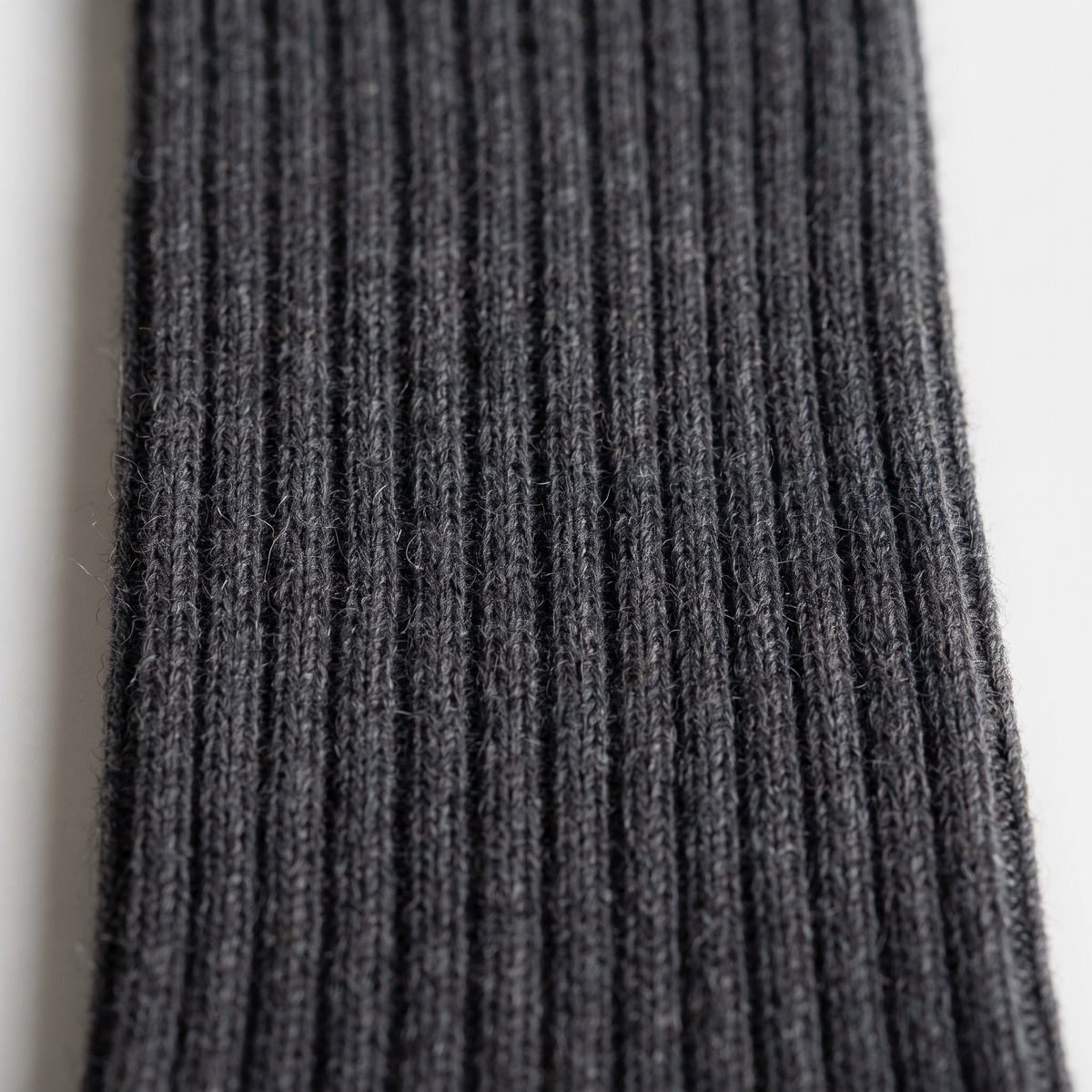 Close-up of the fine merino rib knit