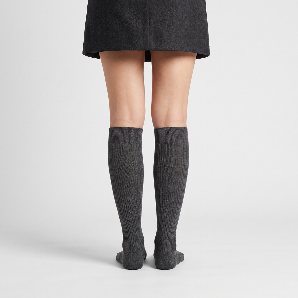 Back view of merino wool knee high socks worn