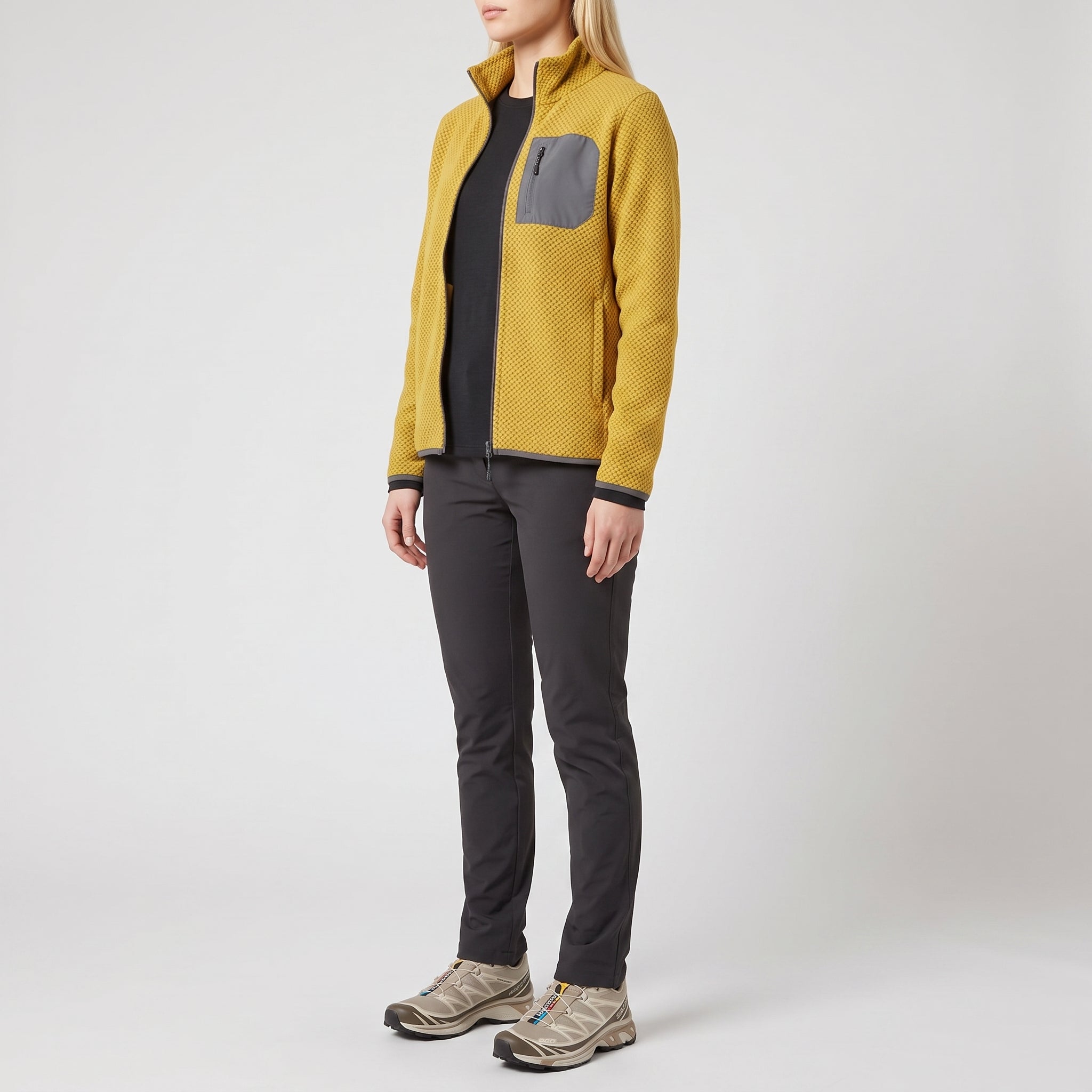 The mustard fleece jacket worn, three-quarter side view