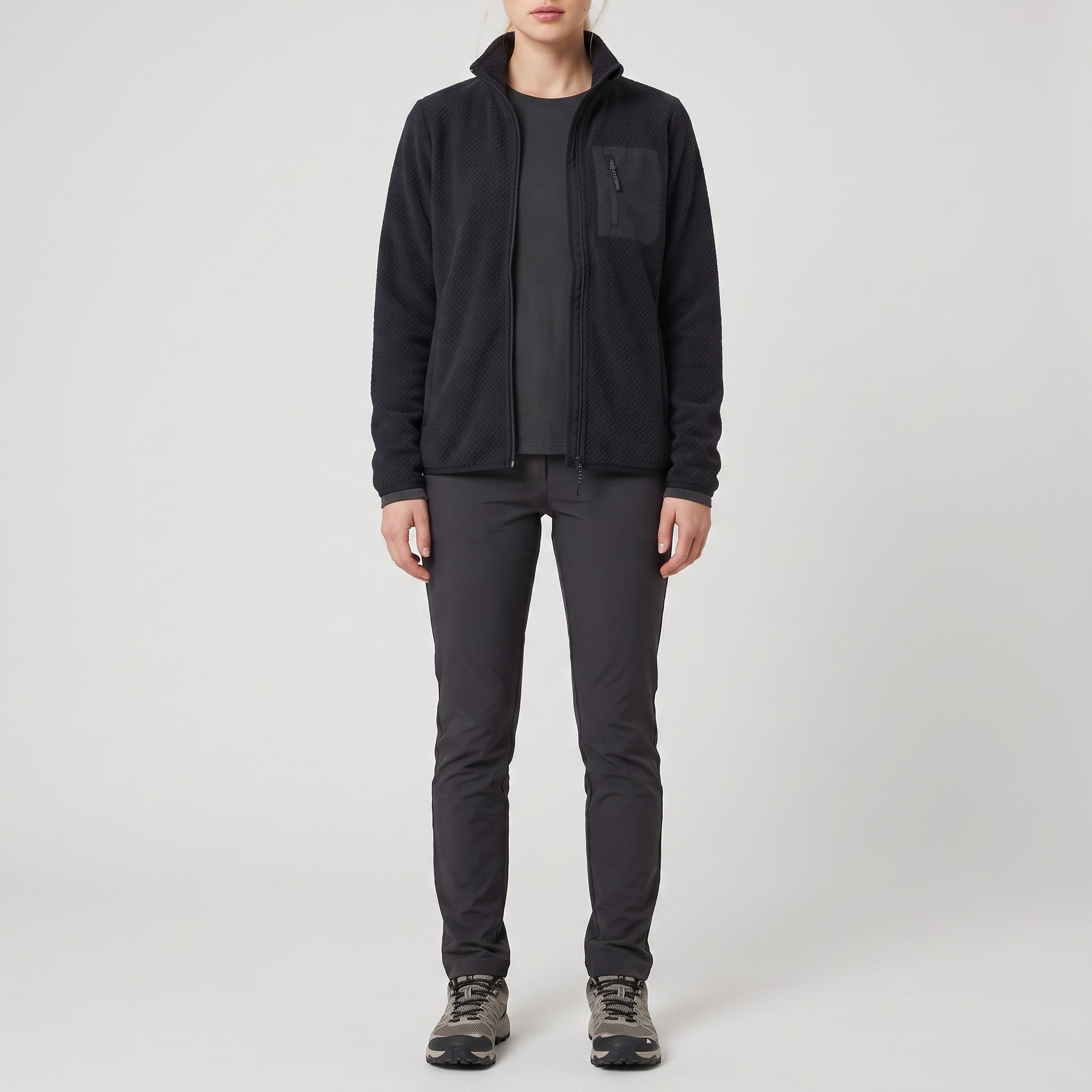 The navy fleece jacket worn open, front view