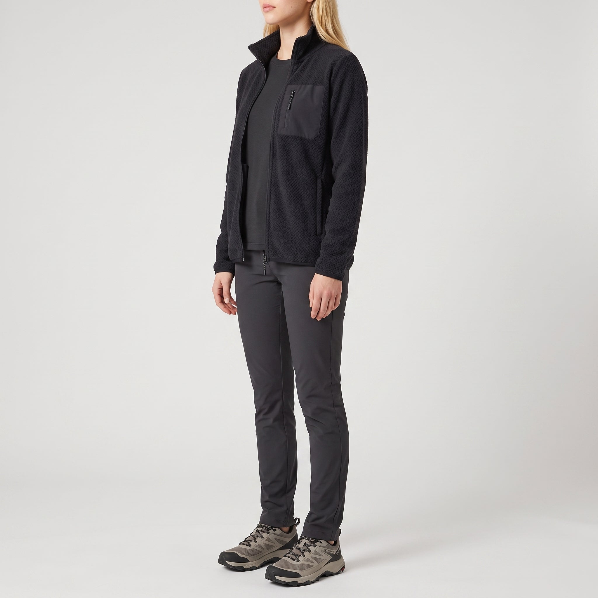 The navy fleece jacket worn, three-quarter side view