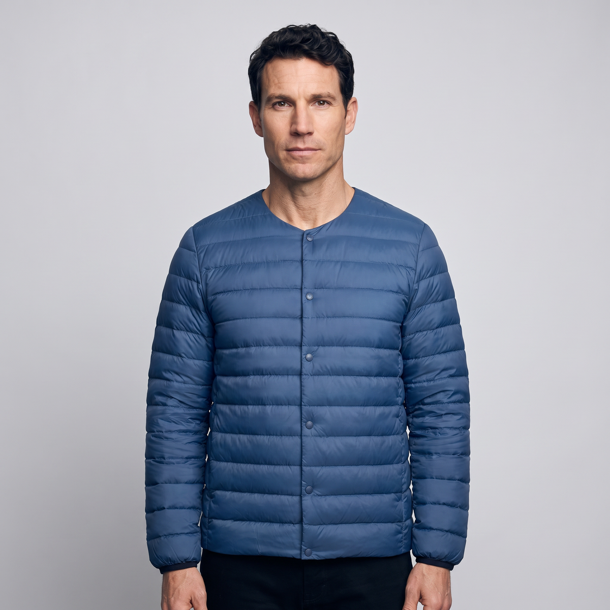 Terrabound Men's Down Jacket in Navy, convertible collar closed, worn front view
