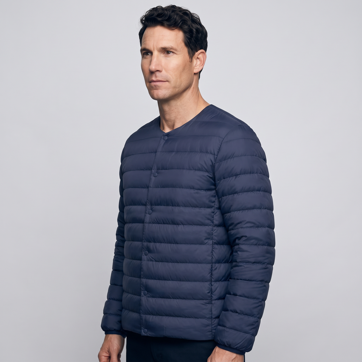 Terrabound Men's Down Jacket in Navy, three-quarter side view